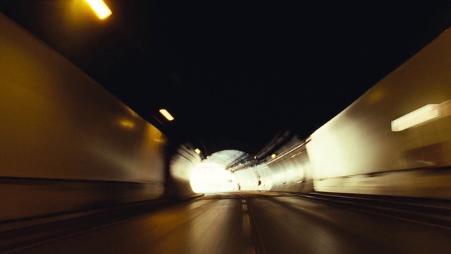 Video Reference: Automotive lighting, Road surface, Asphalt, Mode of transport, Electricity, Thoroughfare, Tunnel, Road, Headlamp, Tints and shades