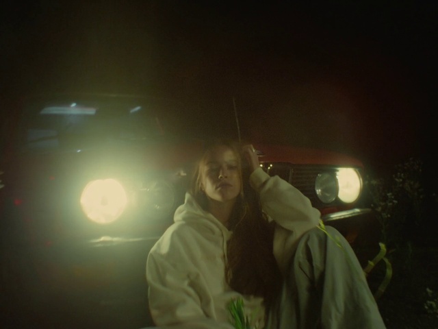 Video Reference: Automotive lighting, Flash photography, Cloud, Sky, Midnight, Lens flare, Jacket, Event, Entertainment, Hat