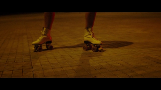 Video Reference: Leg, Sports equipment, Rolling, Road surface, Roller sport, Tints and shades, Skating, Human leg, Asphalt, Flooring