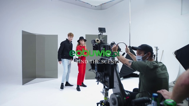 Video Reference: Videographer, Automotive design, Camera, Video camera, Tripod, Television crew, Cinematographer, Film crew, T-shirt, Luggage and bags