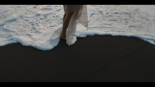 Video Reference: Water, Cloud, Dress, Sky, Wind wave, Freezing, Human leg, Calm, Electric blue, Flooring