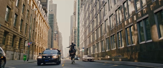 Video Reference: Car, Tire, Building, Wheel, Vehicle, Automotive lighting, Skyscraper, Window, Road surface, Asphalt