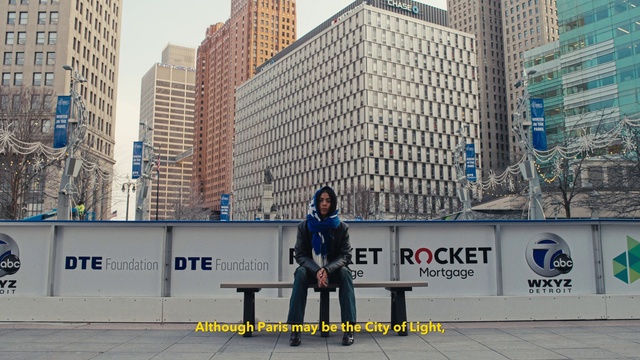 Video Reference: Jeans, Building, Skyscraper, Daytime, Infrastructure, Urban design, Tower block, Public space, Road surface, City