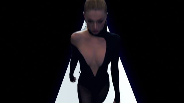 Video Reference: Hair, Arm, Shoulder, Neck, Flash photography, Sleeve, Black hair, Fashion design, Blazer, Fashion model