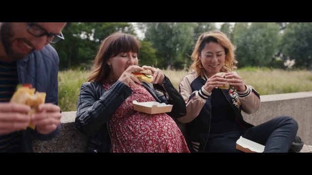 Video Reference: Clothing, Food, Smile, Sharing, Tableware, Happy, Gesture, Food craving, Finger, Fruit