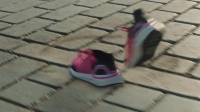 Video Reference: Purple, Road surface, Baby & toddler shoe, Flooring, Floor, Wood, Pink, Walking shoe, Asphalt, Tints and shades