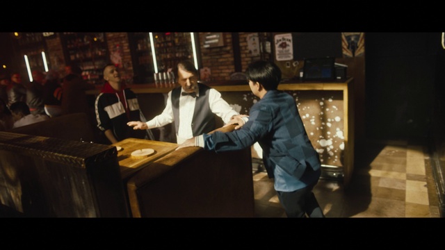Video Reference: Table, Chair, Flash photography, Desk, Event, Fun, Font, Space, Entertainment, Suit