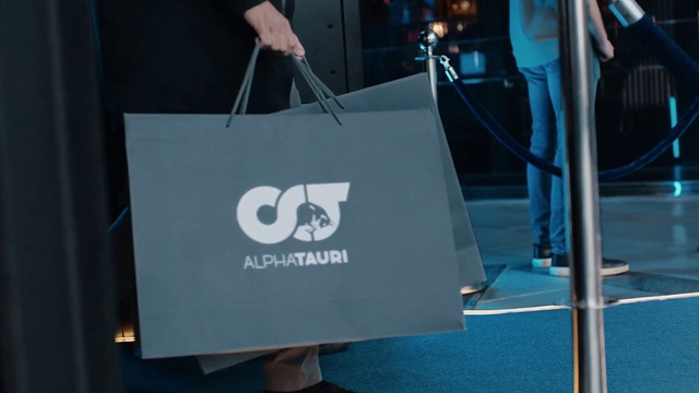 Video Reference: Sleeve, Font, Bag, Electric blue, Event, Luggage and bags, Gadget, Brand, Logo, Fashion accessory