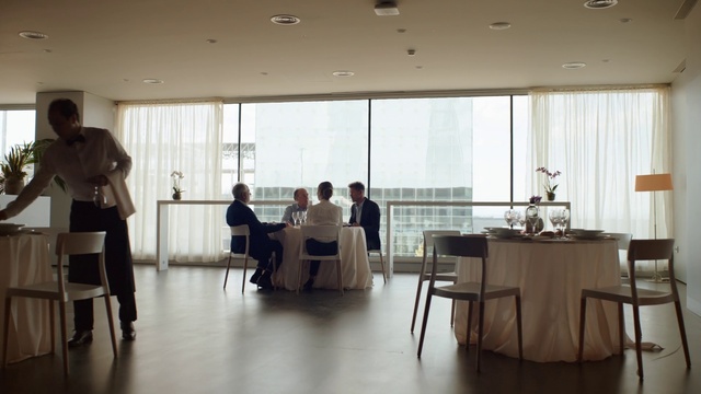 Video Reference: Furniture, Table, Building, Chair, Shorts, Wood, Real estate, Flooring, Hall, Hardwood