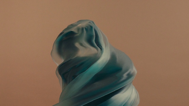 Video Reference: Sculpture, Gesture, Food, Art, Electric blue, Frozen dessert, Silk, Fast food, Fashion accessory, Peach