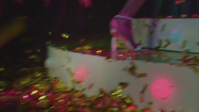 Video Reference: Purple, Pink, Plant, Entertainment, Magenta, Ornament, Christmas ornament, Event, Crowd, Fun