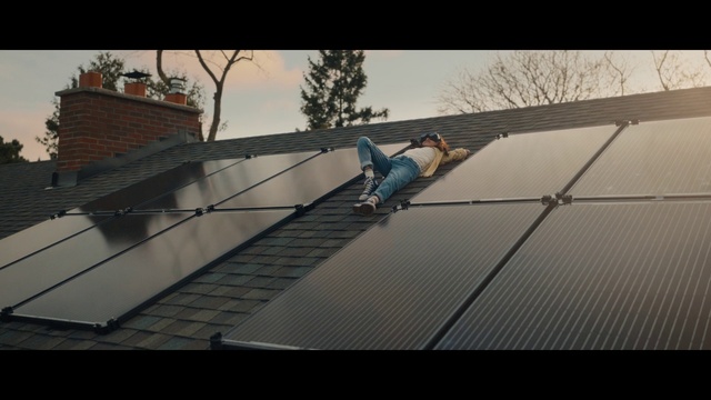 Video Reference: Sky, Tree, Grey, Slope, Wood, Composite material, Building, Sports equipment, Roof, Rolling