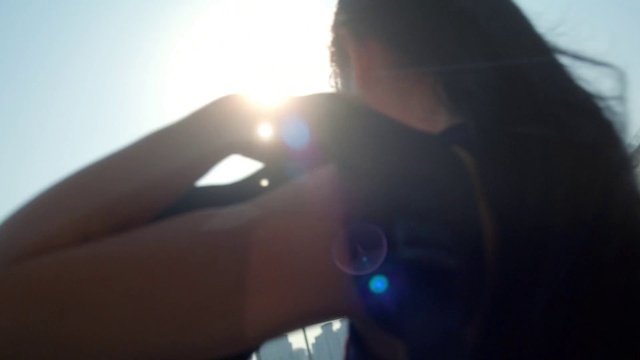 Video Reference: Light, Automotive lighting, Eyewear, Gesture, Lens flare, Tints and shades, Sky, Automotive exterior, Electric blue, Vehicle door
