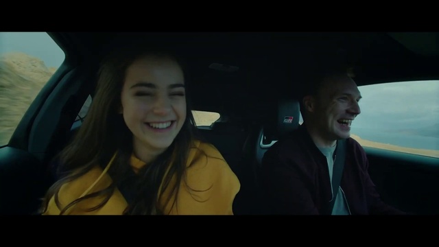 Video Reference: Smile, Automotive design, Flash photography, Gesture, Motor vehicle, Mode of transport, Automotive mirror, Vehicle door, Automotive exterior, Cool