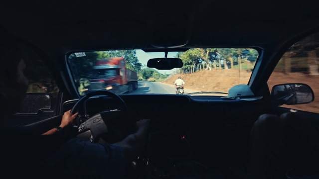 Video Reference: Motor vehicle, Car, Automotive mirror, Automotive lighting, Window, Vehicle, Automotive design, Steering part, Steering wheel, Mode of transport