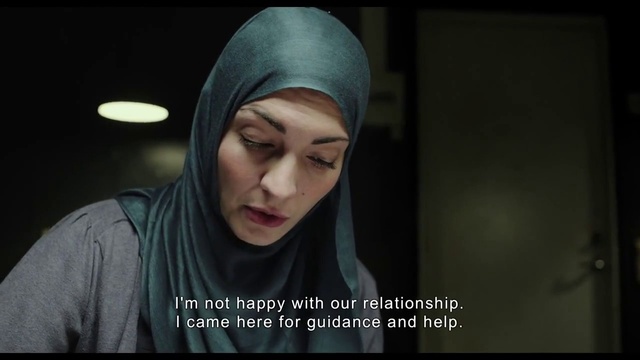 Video Reference: Eyebrow, Human, Flash photography, Sleeve, Cap, Eyelash, T-shirt, Darkness, Electric blue, Knit cap