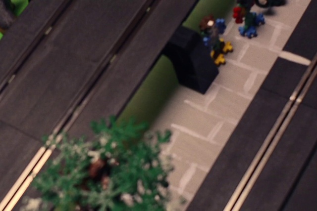 Video Reference: Wood, Road surface, Building, Asphalt, Tints and shades, Plant, Road, Urban design, City, Landscape