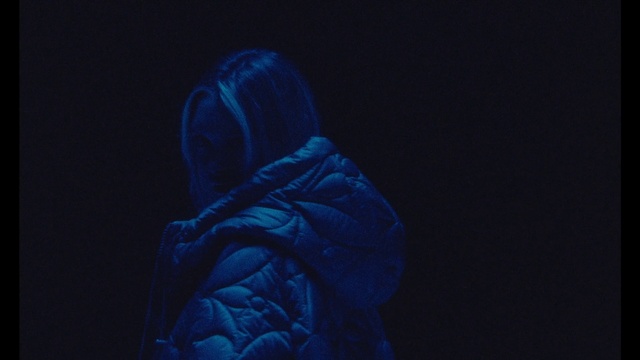 Video Reference: Blue, Sleeve, Flash photography, Jacket, Electric blue, Font, Hood, Athletic shoe, Event, Freezing