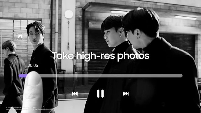 Video Reference: Hairstyle, Facial expression, Sleeve, Standing, Black-and-white, Gesture, Interaction, Style, Street fashion, Font