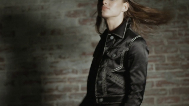 Video Reference: Lip, Outerwear, Street fashion, Neck, Flash photography, Fashion, Sleeve, Grey, Eyelash, Leather jacket