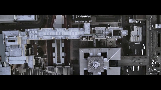 Video Reference: Rectangle, Building, Font, Urban design, Symmetry, Facade, Space, Pattern, Engineering, City