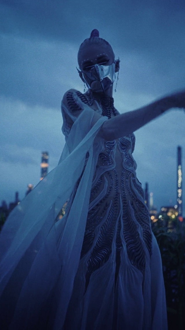 Video Reference: Cloud, Sky, Flash photography, Sculpture, Happy, Art, Electric blue, Fun, Event, Gown