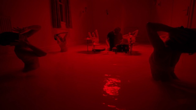 Video Reference: Human body, Chair, Pink, Flooring, Performing arts, Entertainment, Magenta, Red, Art, Tints and shades