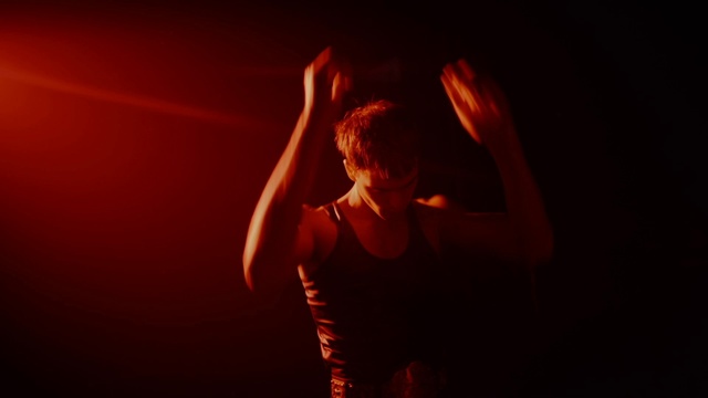 Video Reference: Hand, Arm, Flash photography, Gesture, Musician, Artist, Music, Elbow, Audio equipment, Music artist