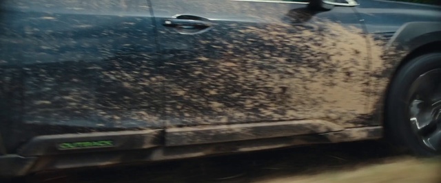 Video Reference: Hood, Automotive tire, Automotive lighting, Grille, Bumper, Road surface, Asphalt, Motor vehicle, Automotive exterior, Wood