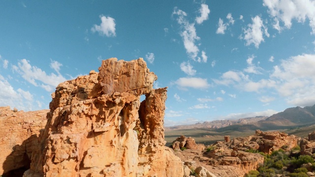 Video Reference: Cloud, Sky, Plant, Mountain, Bedrock, Natural landscape, Tree, Terrain, Formation, Landscape