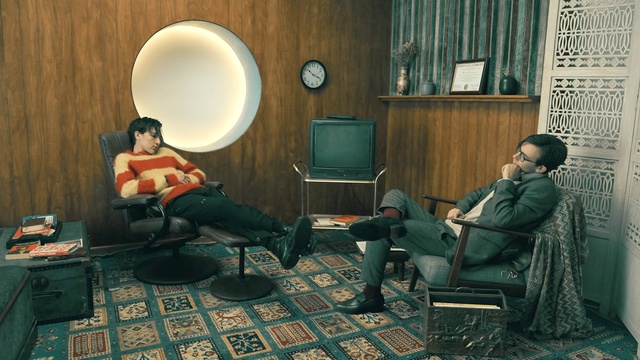 Video Reference: Furniture, Leg, Green, Comfort, Window, Interior design, Lighting, Living room, Lamp, Chair