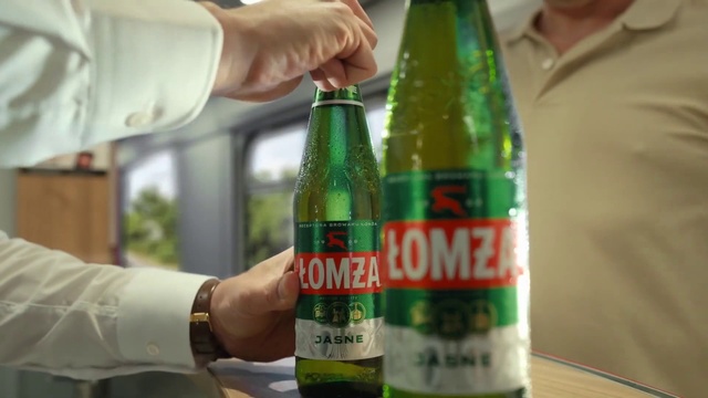 Video Reference: Hand, Bottle, Drinkware, Watch, Green, Fluid, Liquid, Glass bottle, Alcoholic beverage, Drink