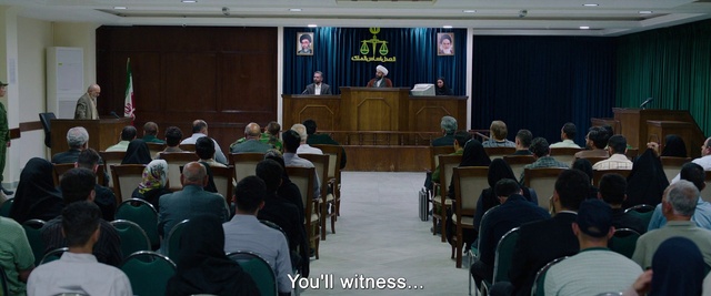 Video Reference: Chair, Social group, Curtain, Flag, Suit, Public speaking, Podium, Event, Class, Projection screen