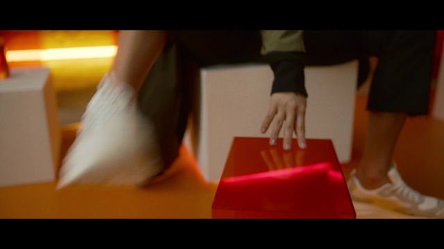 Video Reference: Gesture, Finger, Shorts, Thumb, Nail, Wood, Entertainment, Tints and shades, Flooring, Font