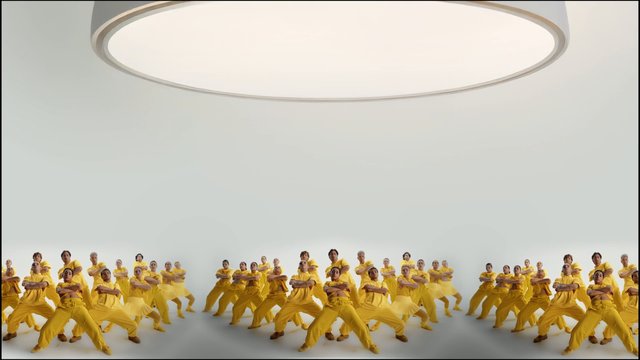 Video Reference: dancers, dance studio, yellow outfits, group performance, synchronized pose, white background, studio lighting, ensemble, choreography, stage, performance, modern dance, large group, minimal set, ceiling light