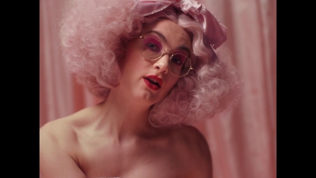 Video Reference: Lip, Hand, Arm, Eyelash, Mouth, Human body, Flash photography, Jaw, Lipstick, Gesture
