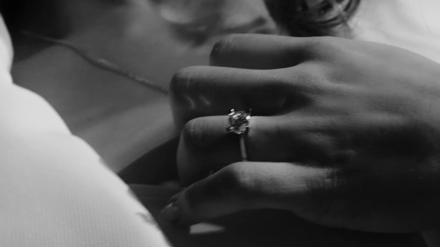 Video Reference: Body jewelry, Gesture, Finger, Black-and-white, Style, Thumb, Wedding ring, Wrist, Nail, Flash photography