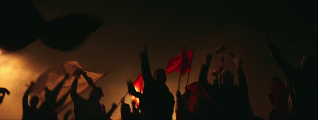 Video Reference: Flag, Gesture, Fire, Sky, Crowd, Event, Heat, Performing arts, Entertainment, Darkness