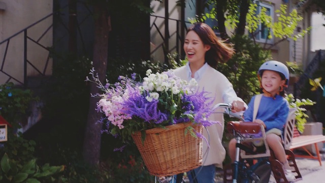 Video Reference: Flower, Plant, Smile, Tire, Purple, Leaf, Wheel, Helmet, Bicycle wheel, Happy