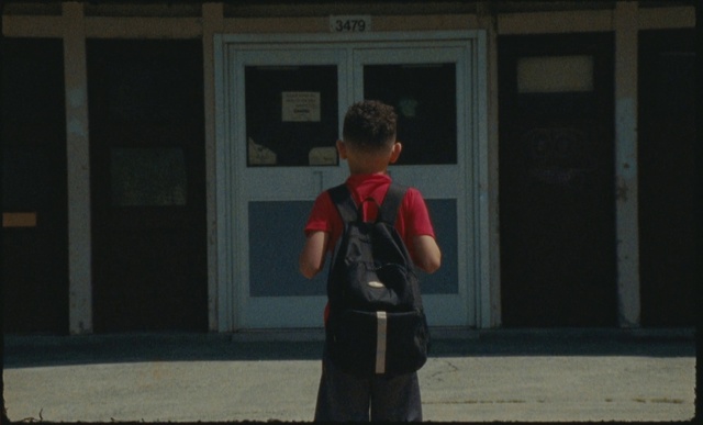 Video Reference: Grey, Luggage and bags, Bag, Door, Tints and shades, Backpack, Travel, Facade, Recreation, Electric blue