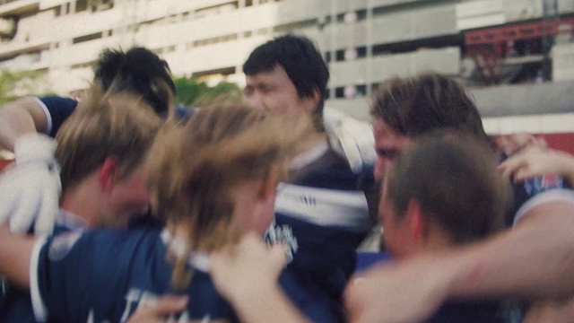 Video Reference: Gesture, Fun, T-shirt, Crowd, Event, Team, Audience, Room, Public event, Fur