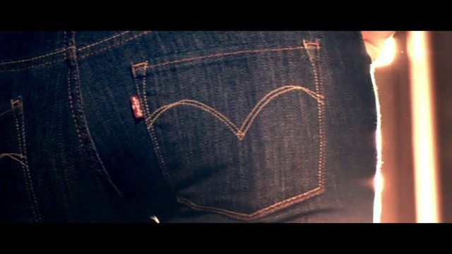 Video Reference: jeans, denim, back pocket, clothing, close-up, fabric, stitching, waistband, casual wear, blue, fashion, texture