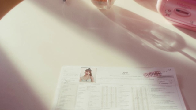 Video Reference: Gesture, Font, Magenta, Paper, Paper product, Plant, Publication