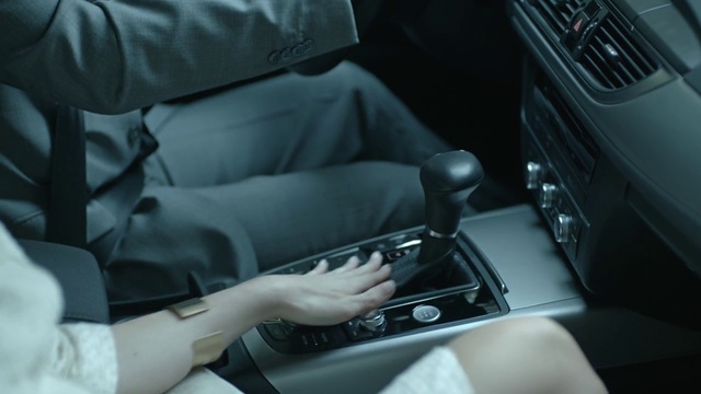 Video Reference: Hand, Gear shift, Motor vehicle, Car, Automotive design, Steering part, Dress, Comfort, Steering wheel, Vehicle door