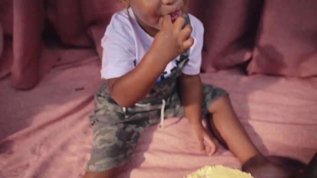 Video Reference: Skin, Mouth, Comfort, Sleeve, Smile, Gesture, Pink, Finger, Thumb, Baby & toddler clothing