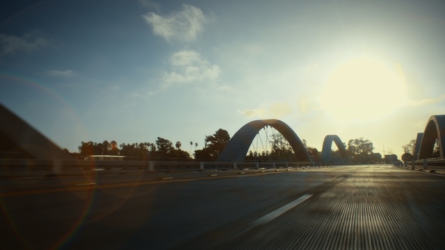 Video Reference: Sky, Cloud, Plant, Road surface, Asphalt, Automotive lighting, Tree, Dusk, Landscape, Sunset