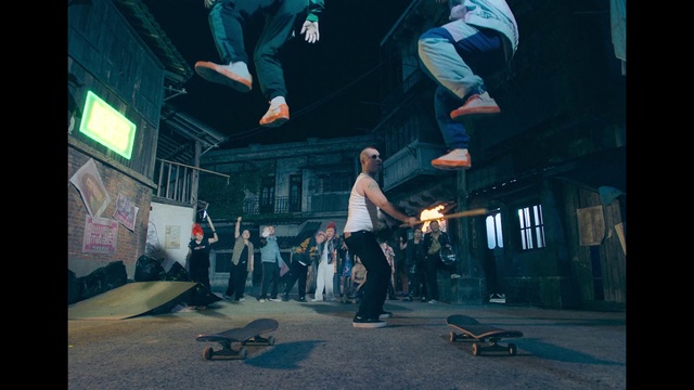 Video Reference: Light, Blue, Flash photography, Street stunts, Entertainment, Stunt performer, Sports equipment, Performing arts, Rolling, Event