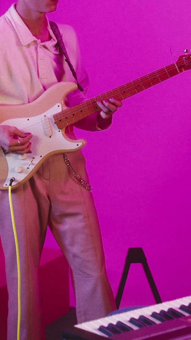 Video Reference: Musical instrument, Arm, Guitar, Purple, Guitar accessory, Musical keyboard, Piano, Guitarist, Musician, Music