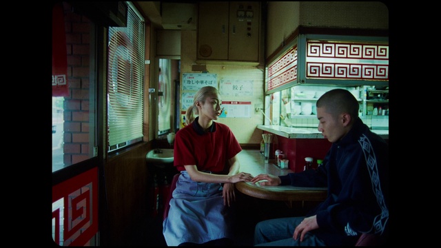 Video Reference: Table, Leisure, Event, Street, T-shirt, Sitting, Fun, Room, Machine, Recreation