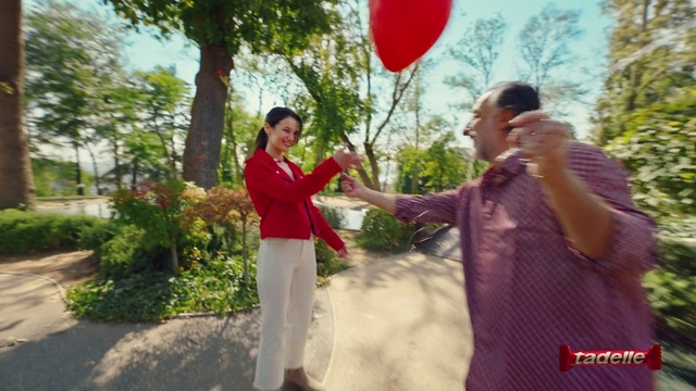 Video Reference: Plant, Tie, Botany, Tree, Balloon, Gesture, Sky, Happy, Interaction, Leisure